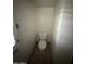 Small toilet room with tiled floor at 801 W Earll Dr, Phoenix, AZ 85013