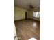 Bedroom with wood flooring, ceiling fan and window at 801 W Earll Dr, Phoenix, AZ 85013