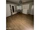 Bedroom with large closet and wood flooring at 801 W Earll Dr, Phoenix, AZ 85013