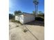 Detached two-car garage with a concrete driveway at 801 W Earll Dr, Phoenix, AZ 85013