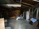 Unfinished garage with ample storage space at 801 W Earll Dr, Phoenix, AZ 85013