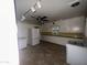 Kitchen features white cabinets and appliances at 801 W Earll Dr, Phoenix, AZ 85013