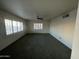 Spacious living room with neutral carpeting at 801 W Earll Dr, Phoenix, AZ 85013