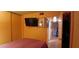 Bright bedroom with double doors leading to hallway at 8221 E Garfield St # L122, Scottsdale, AZ 85257