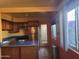 Updated kitchen with stainless steel appliances and wood cabinets at 8221 E Garfield St # L122, Scottsdale, AZ 85257