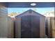 Convenient outdoor storage shed for extra storage space at 8221 E Garfield St # L122, Scottsdale, AZ 85257