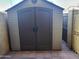 Exterior storage shed with double doors at 8221 E Garfield St # L122, Scottsdale, AZ 85257