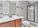 Simple bathroom with a walk-in shower and wood vanity at 8334 E Inca St, Mesa, AZ 85207