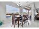 Bright breakfast nook with large windows and a view of the pool at 8334 E Inca St, Mesa, AZ 85207