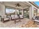 Relaxing patio with wicker furniture and ceiling fan at 8334 E Inca St, Mesa, AZ 85207