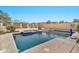 Relaxing backyard pool with a spa and patio area at 8334 E Inca St, Mesa, AZ 85207