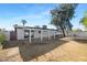 Spacious backyard with covered patio and lawn area at 8626 E Montebello Ave, Scottsdale, AZ 85250