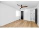 Light and airy bedroom with ensuite bathroom and ceiling fan at 8626 E Montebello Ave, Scottsdale, AZ 85250