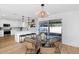 Modern kitchen with white cabinets, quartz countertops, and island at 8626 E Montebello Ave, Scottsdale, AZ 85250