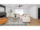 Living room with hardwood floors, fireplace, and neutral decor at 8626 E Montebello Ave, Scottsdale, AZ 85250