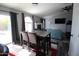 Dining area with granite table and view into living room at 903 W Loughlin Dr, Chandler, AZ 85225