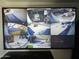 Wall mounted security monitor displays multiple camera views around the property at 903 W Loughlin Dr, Chandler, AZ 85225
