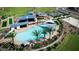 Aerial view of community pool with shaded seating and nearby amenities at 43400 N Wollemi St, Queen Creek, AZ 85140