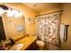 Clean bathroom with granite countertops and updated shower at 941 W Peralta Ave, Mesa, AZ 85210