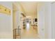 Bright, inviting hallway featuring tile flooring and access to other rooms at 941 W Peralta Ave, Mesa, AZ 85210