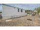 Exterior side view of the home and backyard area at 9431 E Coralbell Ave # 198, Mesa, AZ 85208