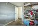 Walk-in closet providing ample storage with installed shelving and hanging space at 9431 E Coralbell Ave # 198, Mesa, AZ 85208