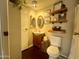 Clean bathroom with wood vanity and shelves at 9431 E Coralbell Ave, Mesa, AZ 85208