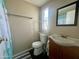 Small bathroom with a toilet and vanity at 9431 E Coralbell Ave, Mesa, AZ 85208