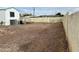 Large gravel backyard of a manufactured home with block wall at 9431 E Coralbell Ave, Mesa, AZ 85208