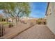 Landscaped backyard with gravel and a fence at 9862 E Flower Ave, Mesa, AZ 85208