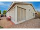 Home's exterior showcasing a screened patio at 9862 E Flower Ave, Mesa, AZ 85208