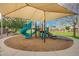 playground with a shaded play structure and slide at 9862 E Flower Ave, Mesa, AZ 85208