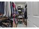 Walk-in closet with ample shelving and hanging space at 10101 N Arabian Trl # 2052, Scottsdale, AZ 85258