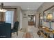 Condo dining area with a view into kitchen and entryway at 10101 N Arabian Trl # 2052, Scottsdale, AZ 85258