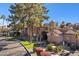 Two-story building with Spanish-style architecture and landscaping at 10101 N Arabian Trl # 2052, Scottsdale, AZ 85258