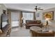 Cozy living room with leather furniture and a fireplace at 10101 N Arabian Trl # 2052, Scottsdale, AZ 85258