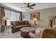 Relaxing living room with leather furniture and southwestern decor at 10101 N Arabian Trl # 2052, Scottsdale, AZ 85258