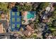 Aerial view of community pool and tennis courts at 10101 N Arabian Trl # 2052, Scottsdale, AZ 85258