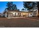 Large backyard with covered patio and gravel area at 10242 E Spring Creek Rd, Sun Lakes, AZ 85248