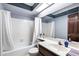 Clean bathroom with tub, shower, and single vanity at 10242 E Spring Creek Rd, Sun Lakes, AZ 85248