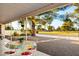 Relaxing patio overlooking a lush golf course at 10242 E Spring Creek Rd, Sun Lakes, AZ 85248