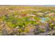 Aerial view of community with pool, clubhouse and green spaces at 12519 W Bajada Rd, Peoria, AZ 85383