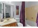 Simple bathroom with tub and a wooden vanity at 12519 W Bajada Rd, Peoria, AZ 85383