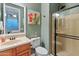 Bathroom with toilet, sink, and a large shower stall at 12519 W Bajada Rd, Peoria, AZ 85383