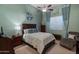 Comfortable bedroom with a double bed and sitting chair at 12519 W Bajada Rd, Peoria, AZ 85383