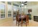 Bright breakfast nook with sliding door access to the backyard and pool area at 12519 W Bajada Rd, Peoria, AZ 85383