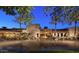 Community center with stone exterior and palm trees at 12519 W Bajada Rd, Peoria, AZ 85383
