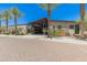 Modern community center with palm trees and brick pavers at 12519 W Bajada Rd, Peoria, AZ 85383