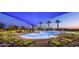 Relaxing community pool area with lounge chairs and shade structures at 12519 W Bajada Rd, Peoria, AZ 85383
