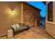 Inviting courtyard with stonework, bench, and gate at 12519 W Bajada Rd, Peoria, AZ 85383